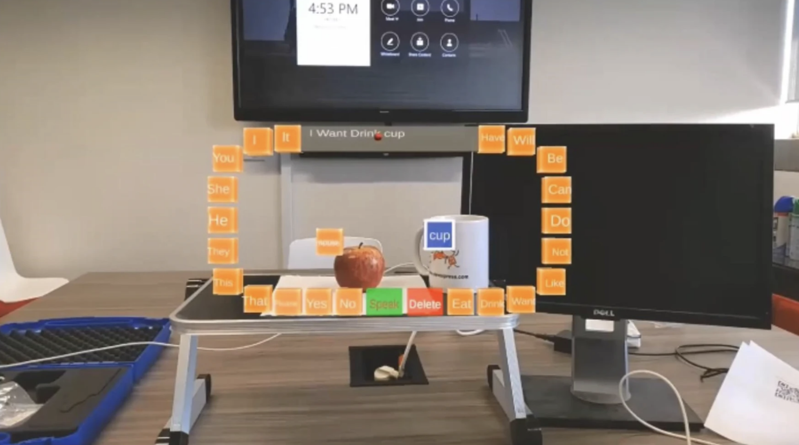 Real scene from a trial showing the AAC system labeling real-world objects for communication.